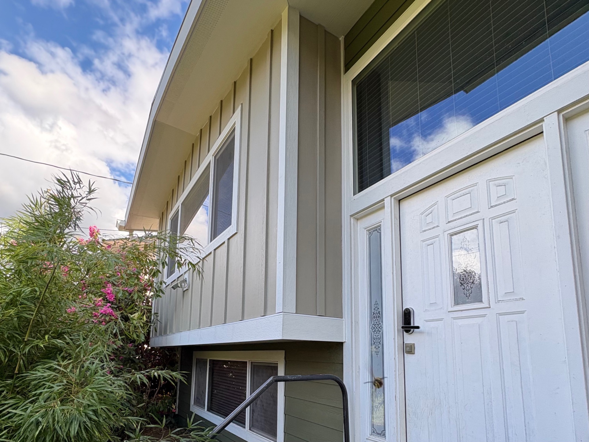 Vertical board and batten siding on a Premier project