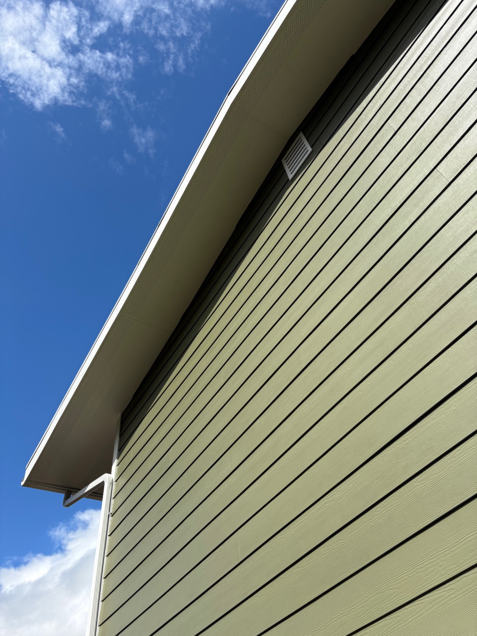 Close view of lap siding and soffit detail